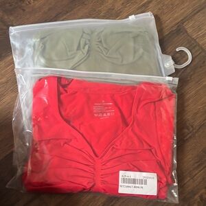 Red and green shape wear bodysuit.